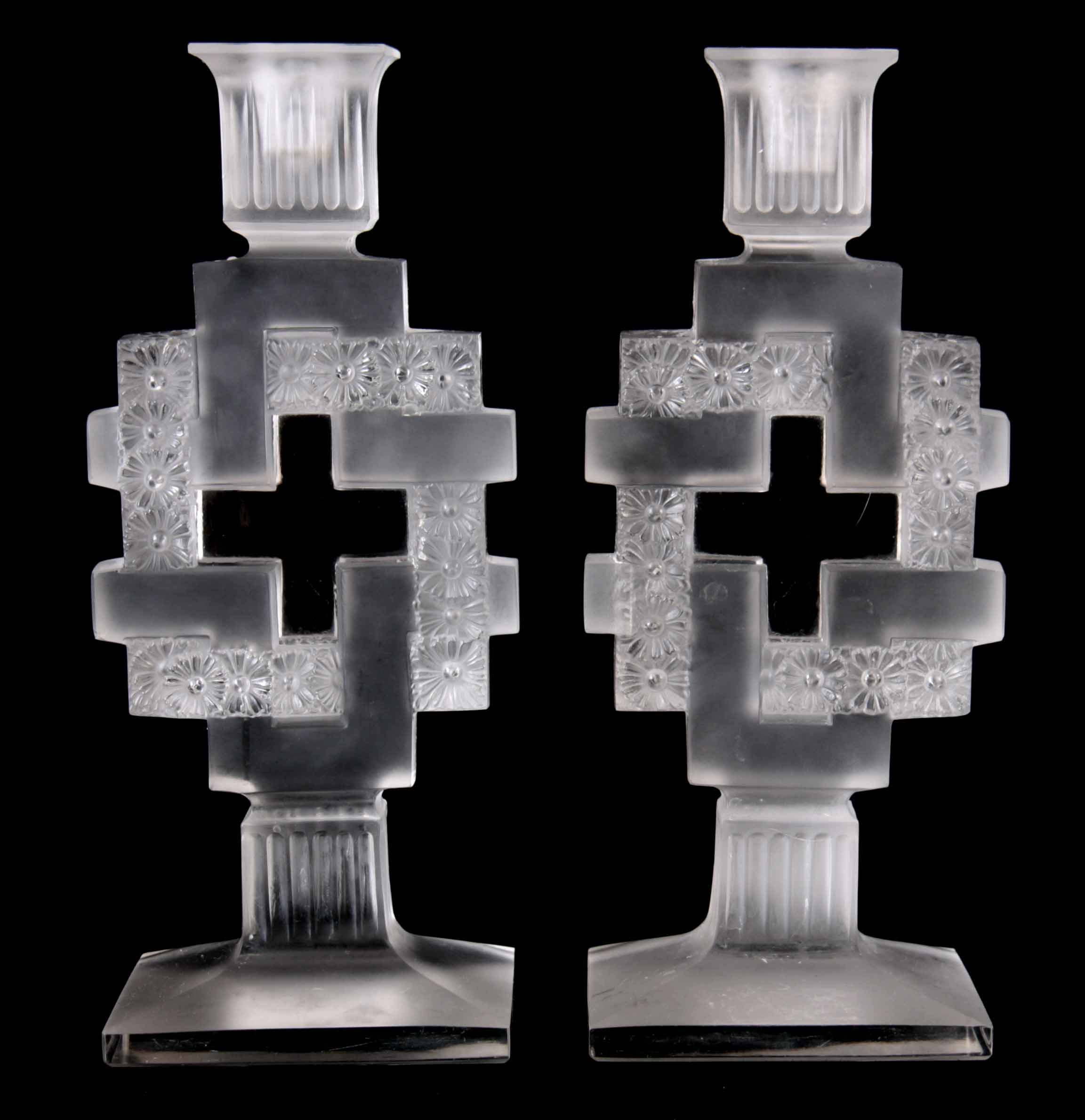 R. LALIQUE A PAIR OF GLASS PAQUERETTES CANDLESTICKS - impressed R. Lalique 23cm high.