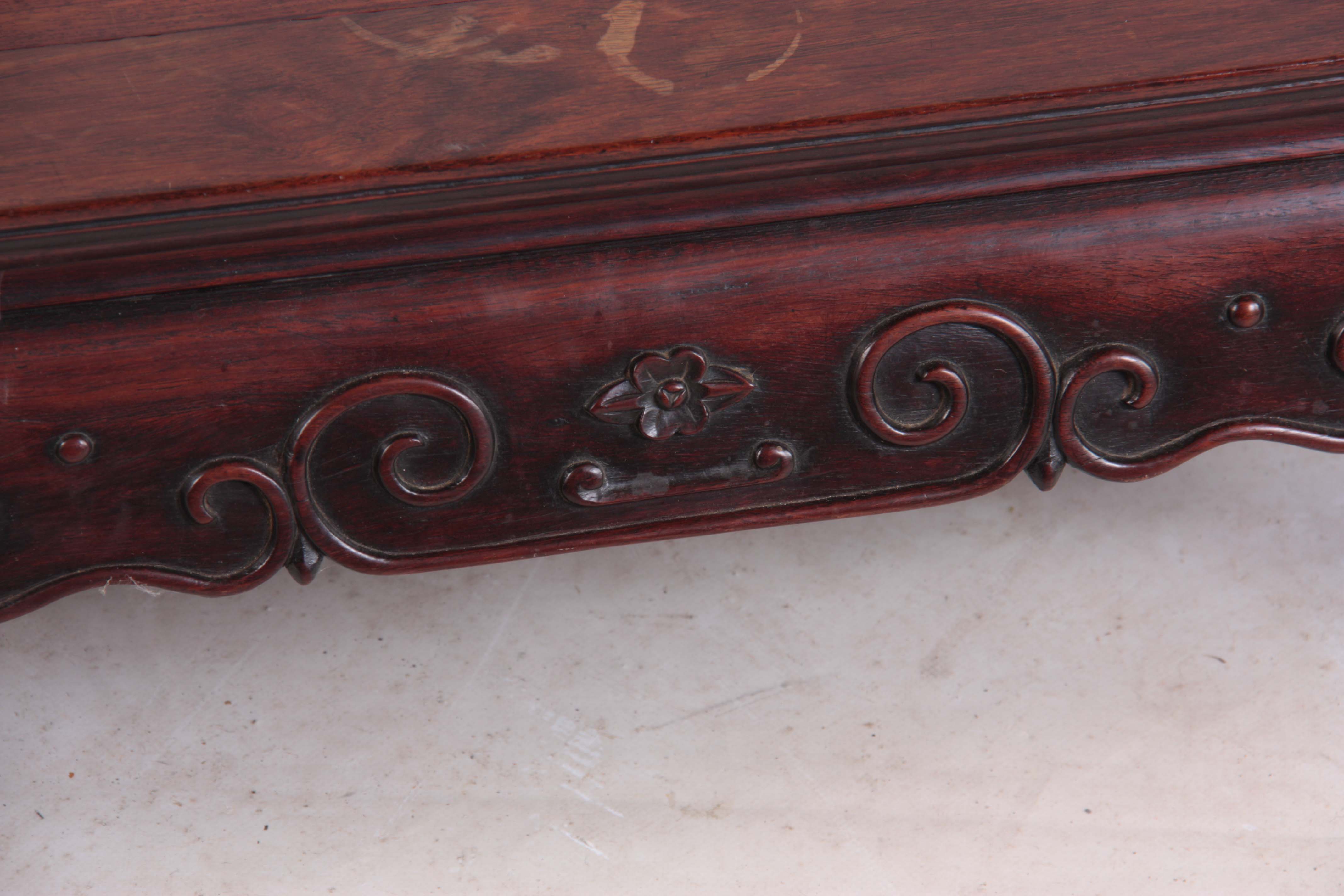 A 19TH CENTURY CHINESE HARDWOOD LOW OCCASIONAL TABLE with panelled top and shaped scroll carved base - Image 5 of 5