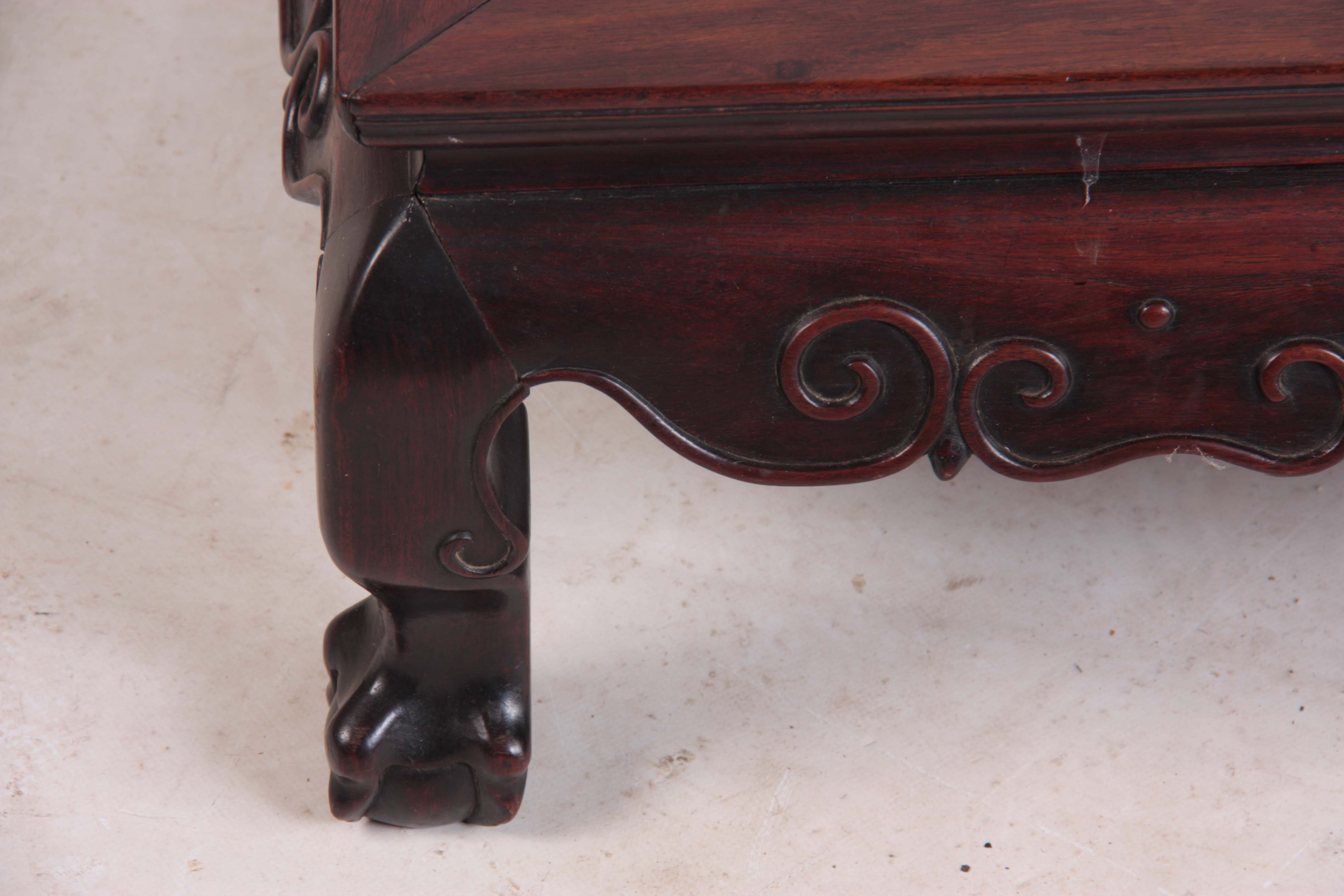 A 19TH CENTURY CHINESE HARDWOOD LOW OCCASIONAL TABLE with panelled top and shaped scroll carved base - Image 4 of 5