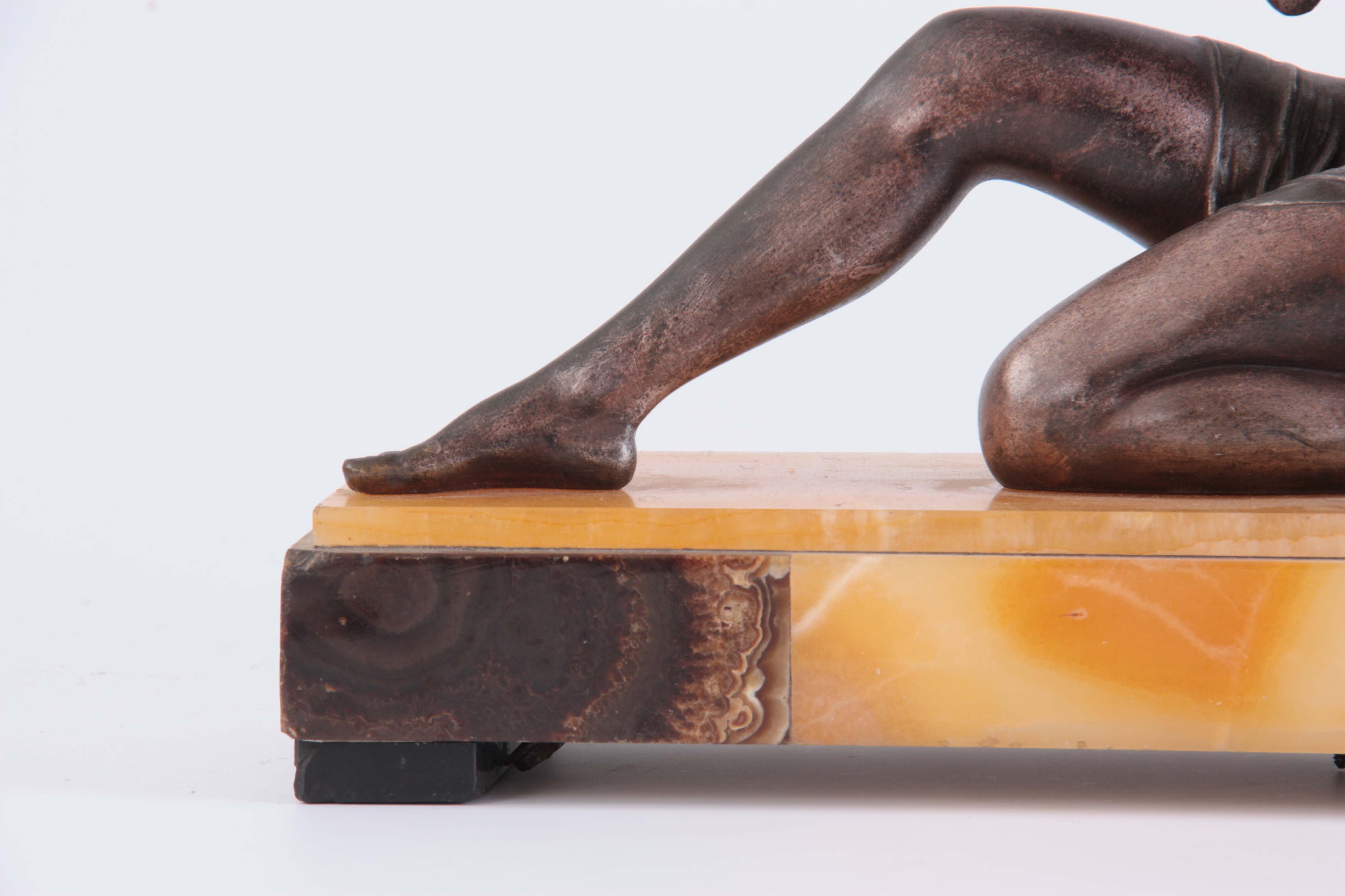 A LARGE ART DECO FIGURAL MARBLE CLOCK SIGNED 'D.H. CHIPARUS' modelled ...