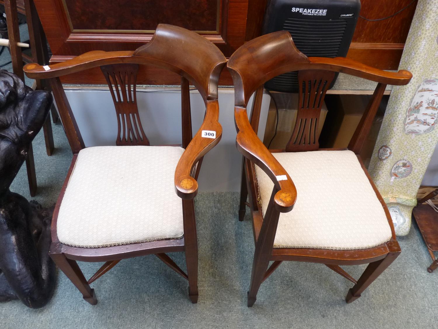 Pair of Edwardian Walnut corner chairs with Satinwood Inlay, Harp backs, supported on tapering