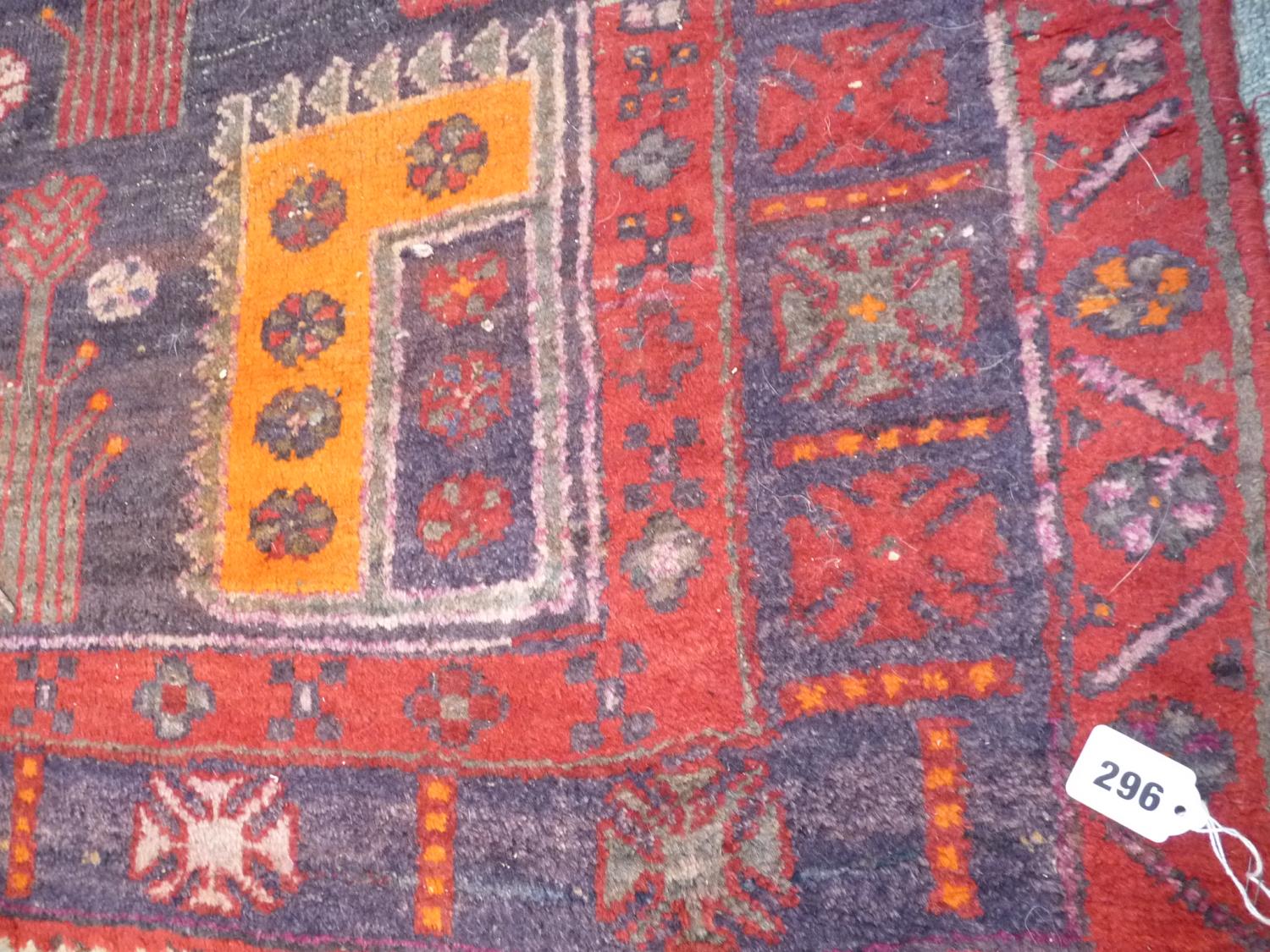 Antique Large Red ground Rug with Tree and Figural decoration, 289 x 168