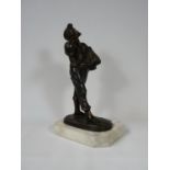 Edwardian Spelter figure of a Boy with newspapers mounted on white marble base, 31cm in Height