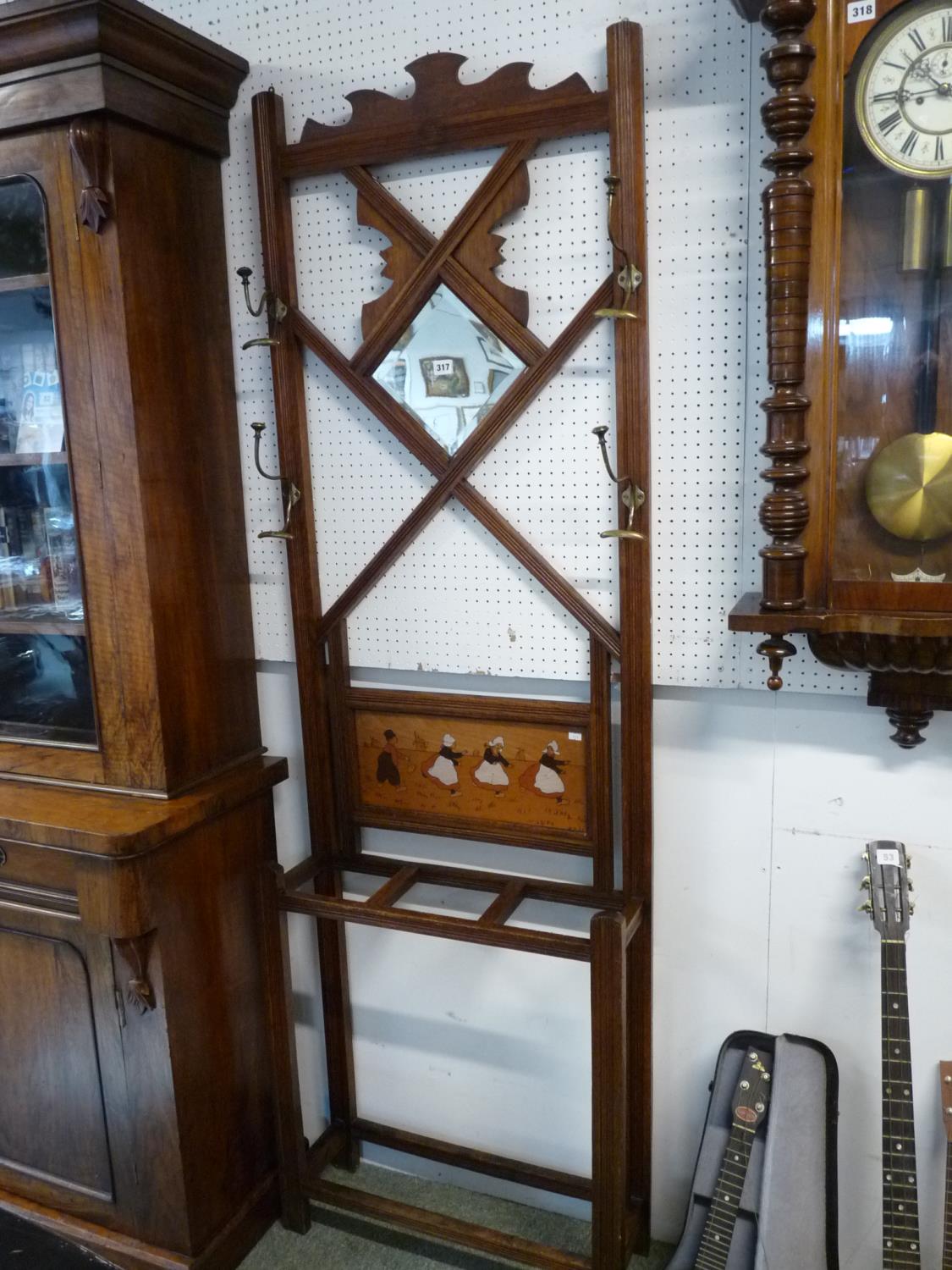 Interesting Oak Hall stand with inset Dutch Panel, Inset mirror and Brass Hangers