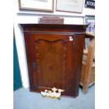 Georgian Oak corner cabinet with inlaid decoration, Shaped shelves to interior