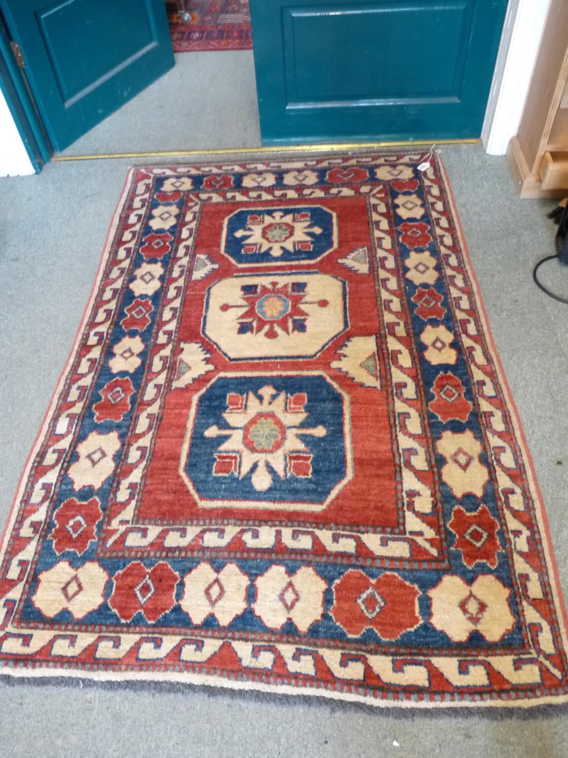 Good Quality Red ground Rug 166 x 110cm