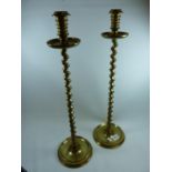 Pair of Tall Brass Barley-twist candlesticks, 54cm in height