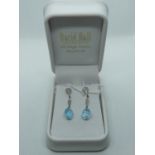 Pair of Good Quality 18ct White Gold Diamond Milligrain set drop earrings terminating on Blue