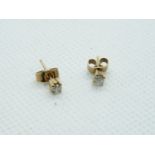 Pair of 9ct Yellow Gold Diamond Studs in claw setting 0.16ct estimated total weight