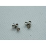 Pair of Ladies 9ct White Gold Diamond Rub-Over Studs 0.10ct total weight estimated