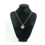 Interesting 9ct Gold rotating dice ball pendant with 9ct Gold Chain, 11.9g total weight
