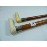 Pair of 19thC Silver Collared Malacca walking canes with Ivory Handles
