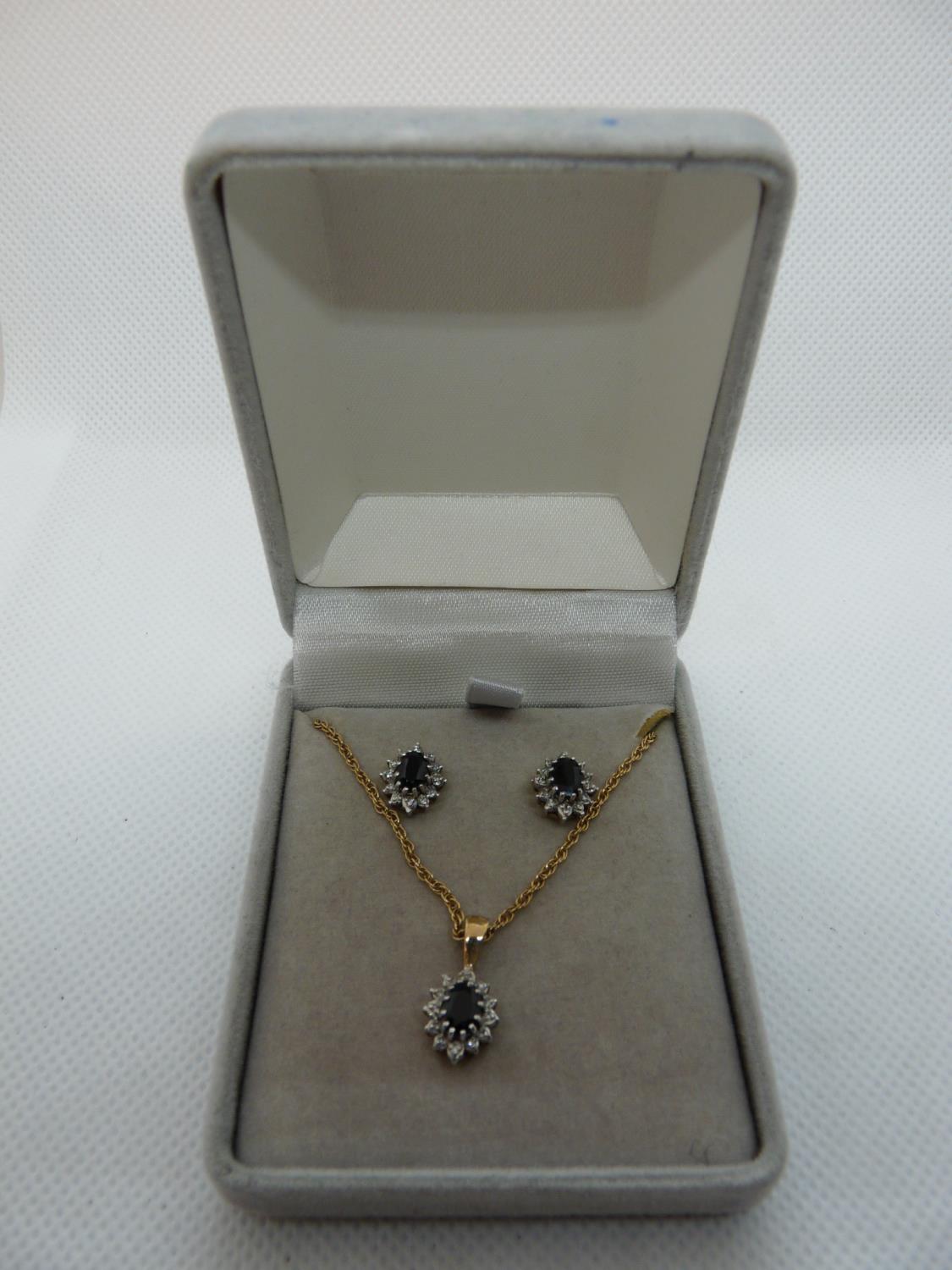 Ladies 9ct Gold Sapphire & Diamond Cluster Suite of pendant on chain and matching earrings, 5.3g