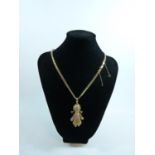 Ladies 9ct Gold Curb necklace with Gem set 9ct Gold Doll Pendant 34.4g total weight