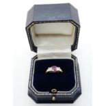 Ladies Art Deco Style 18ct Gold ring with Rubover set Emerald Cut Ruby 0.42ct Estimated, Flanked
