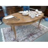 French Oak oval Carved extending dining table on long curved legs