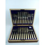 Good quality Walnut cased Canteen of Fish Cutlery with bone handles