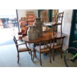 Reprodux Walnut extending regency style dining table and a set of 6 dining chairs