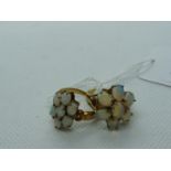 2 Ladies 9ct Yellow gold Rings with Multi Claw set Opals, 8.5g total weight