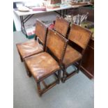 Set of 4 Oak Leather seated and backed chairs on turned supports