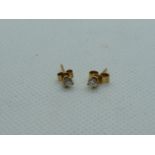 Pair of 9ct Gold Diamond Cluster claw set studs 0.20ct total. 0.45g