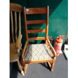 Victorian Mahogany slat back rocking chair with upholstered seat