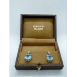 Boxed Robinson Pelham 18ct White Gold earrings set with Cushion Cut Blue Topaz 12ct estimated