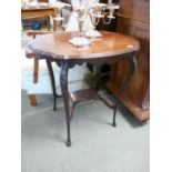 Edwardian Mahogany Window table of oval form with undertier