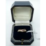 Ladies 9ct Yellow Gold Ring with corssover Ruby & Diamond Channel setting, 3.2g total weight. Size R