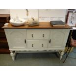 Oak 1920s Sideboard with panel doors and central drawers with brass drop handles