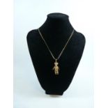 Ladies 9ct Gold Snake chain with 9ct Gold Gem set articulated bear 16g total weight