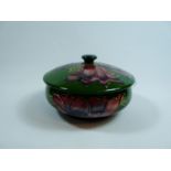 Moorcroft Anemone pattern lidded powder pot with green impressed mark to base, 8cm in Height