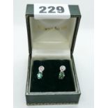 Pair of Good Quality 18ct White Gold Rectangular faceted Green Tourmaline earrings with Rub-over set