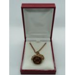 9ct Gold Revolving pendant on chain 17g total weight