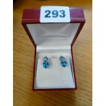 Pair of Blue Topaz Stone set twin earrings on white metal