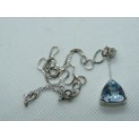 Good Quality Ladies 18ct White Gold Trillion Cut Blue Topaz of High Carat over Claw set Diamond 0.