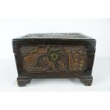 Chinese Camphor wood carved Jewel box decorated with figures and naturalistic setting, supported