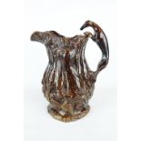 Mid 19thC Treacle Glaze Hunting design jug attributed to Swansea, 27cm in height