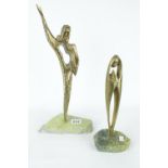 2 1970s Hammered Bronze figures of Virgin Mary and possibly Christ mounted on marble bases.