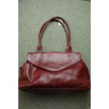 Ladies Radley Red Leather Handbag with pierced motif and cloth bag