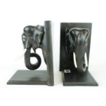 Pair of Edwardian African Ebony bookends with Ivory Trunks and eyes