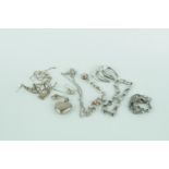 Collection of assorted Silver Chains and earrings