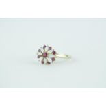 Attractive Ladies 9ct Gold Ruby & Opal Floral design ring 2.9g total weight, Size U
