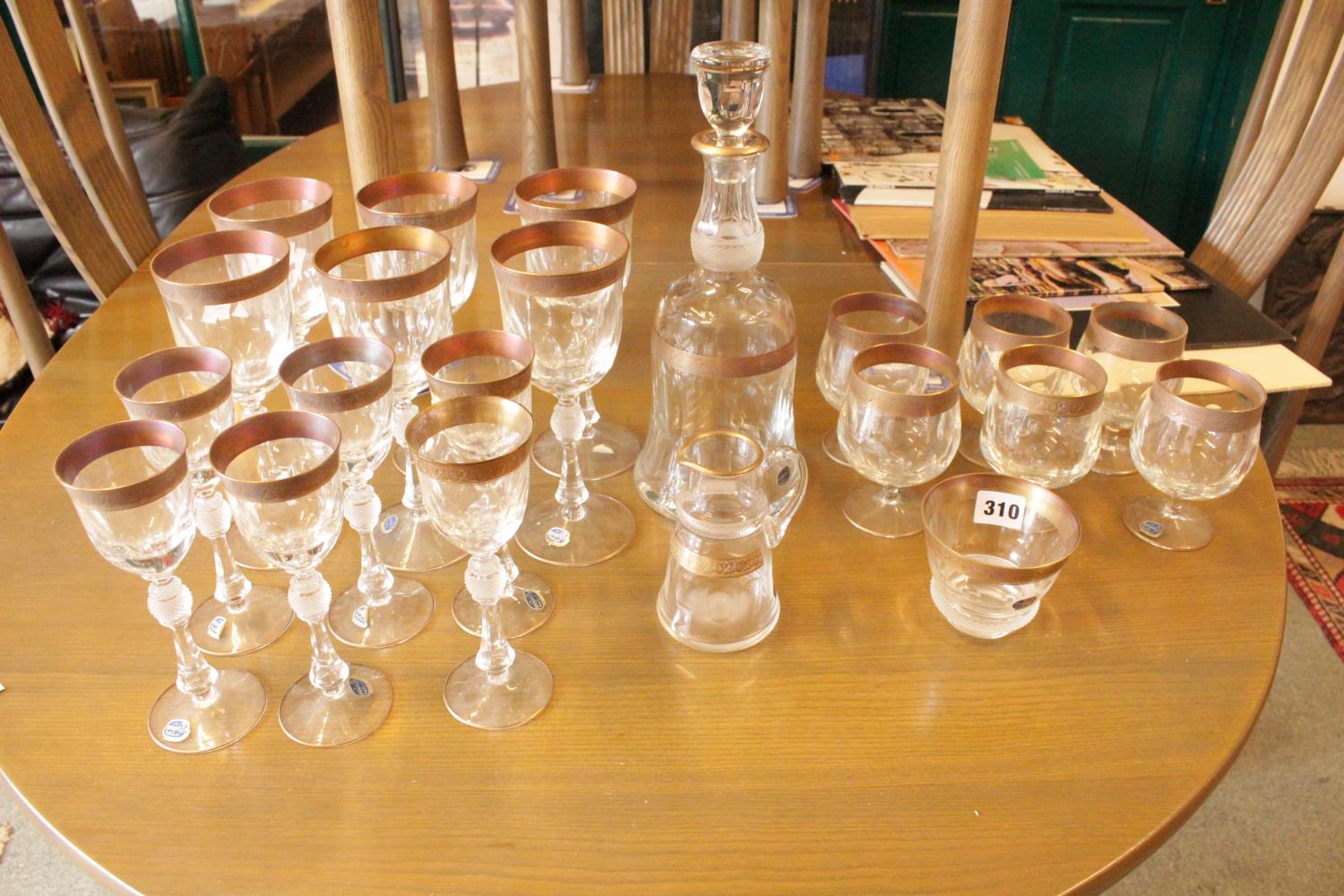 Collection of Good Quality Cut Bohemia Glass with Gilded rim and cut stem