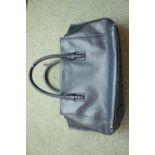 Ladies Radley Navy Handbag with cloth bag