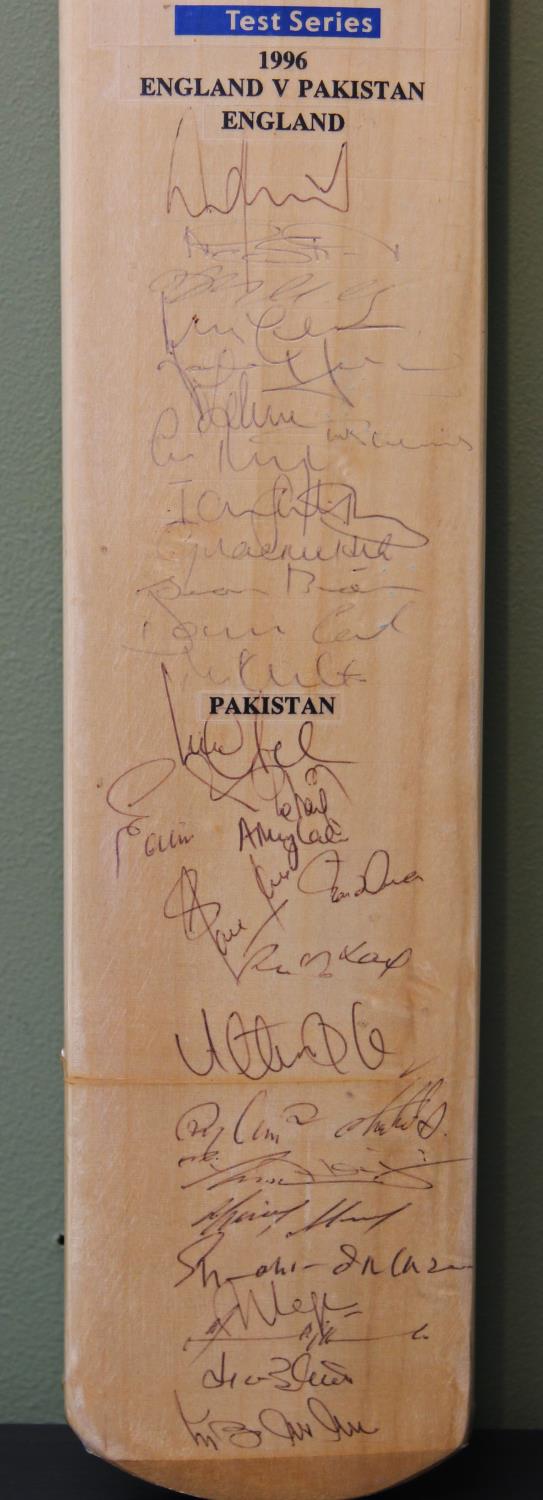 A full size Duncan Fearnley bat hand signed by the England & Pakistan teams at the 1996 Test Series. - Image 2 of 4