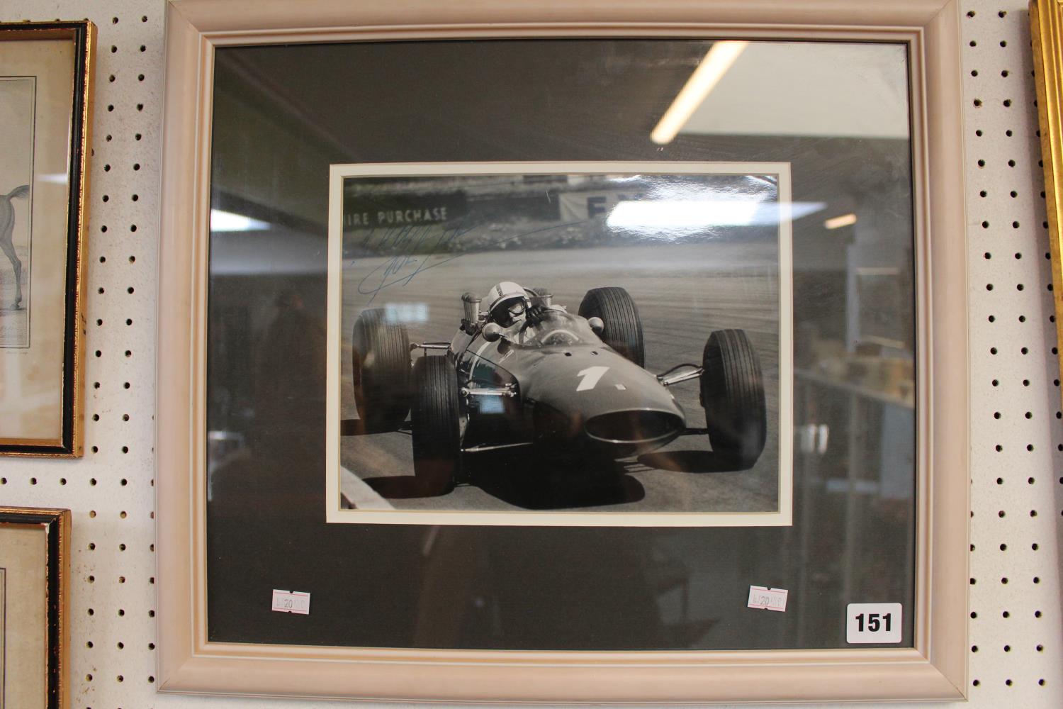 Framed Sepia Photograph of John Surtees, CBE (11 February 1934 – 10 March 2017) driving Formula 1