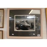 Framed Sepia Photograph of John Surtees, CBE (11 February 1934 – 10 March 2017) driving Formula 1