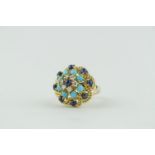 Impressive Cabochon Blue Sapphire and Turquoise set cluster ring with rope garlands on court