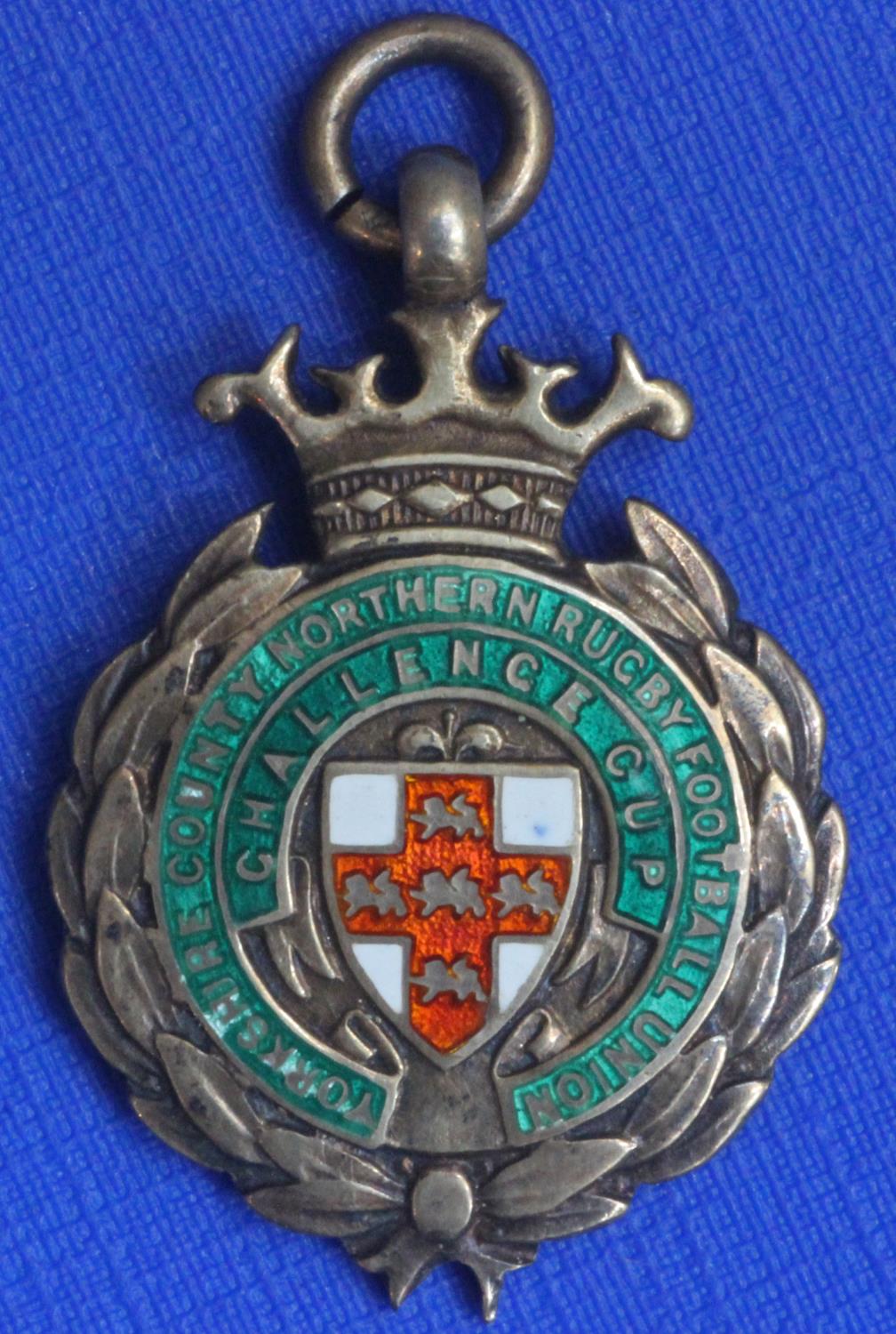 A silver gilt and enamel medal won by the legendary Ken Traill of Bradford Northern for winning